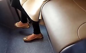 Flashing feet in bus