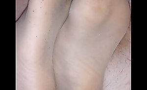 homemade footjob with ripped nylonsocks and cumshot